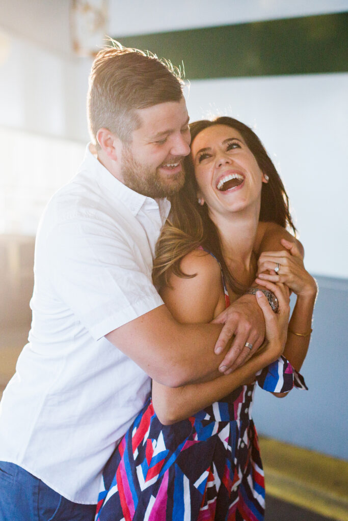Couple posing for San Diego family photographer