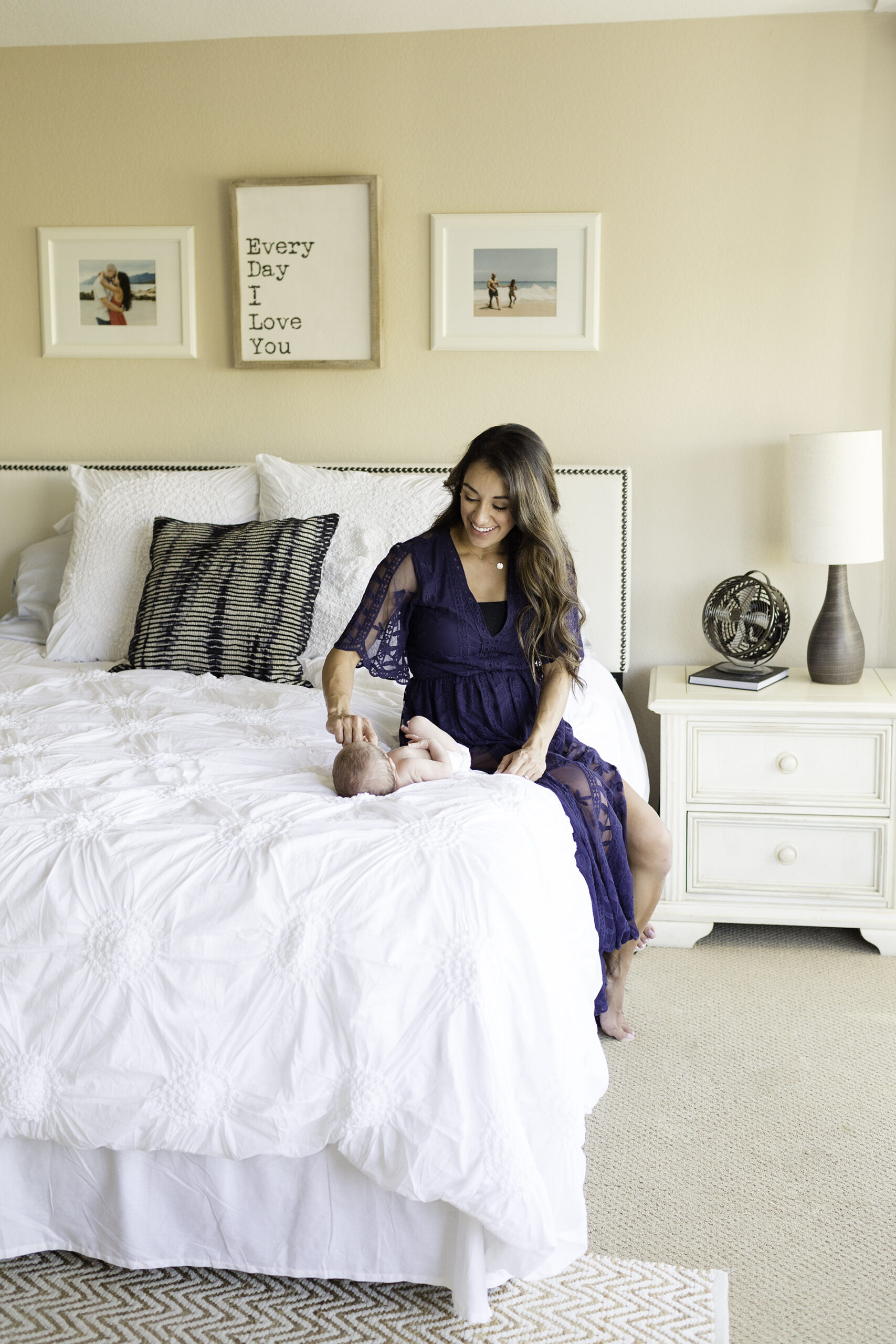 San Diego Lifestyle Newborn Photographer Christine Dammann Photography beautiful mom on bed with baby