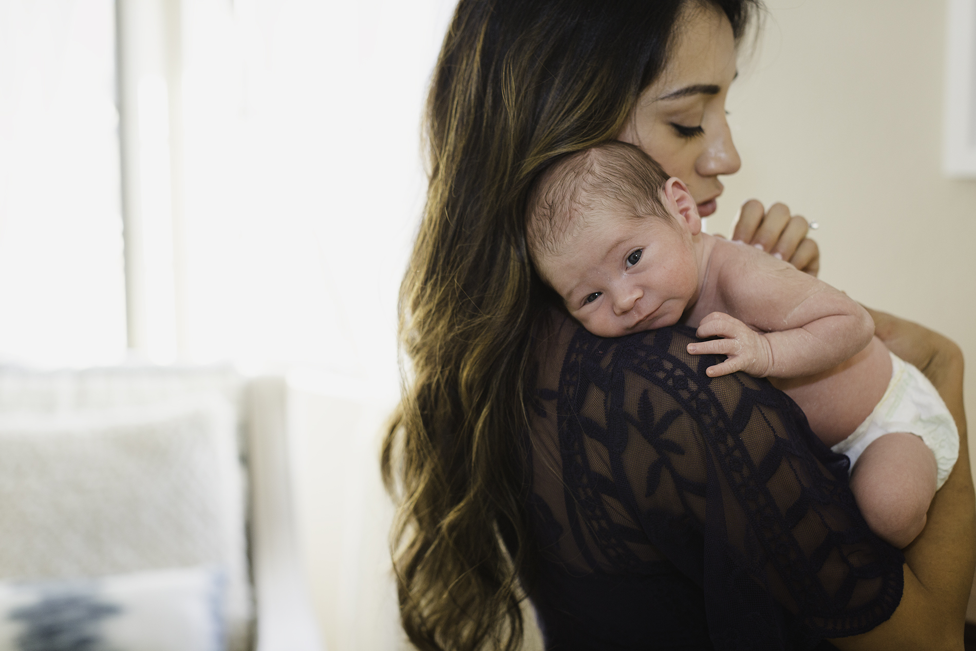 San Diego Lifestyle Newborn Photographer Christine Dammann Photography baby on mothers shoulder