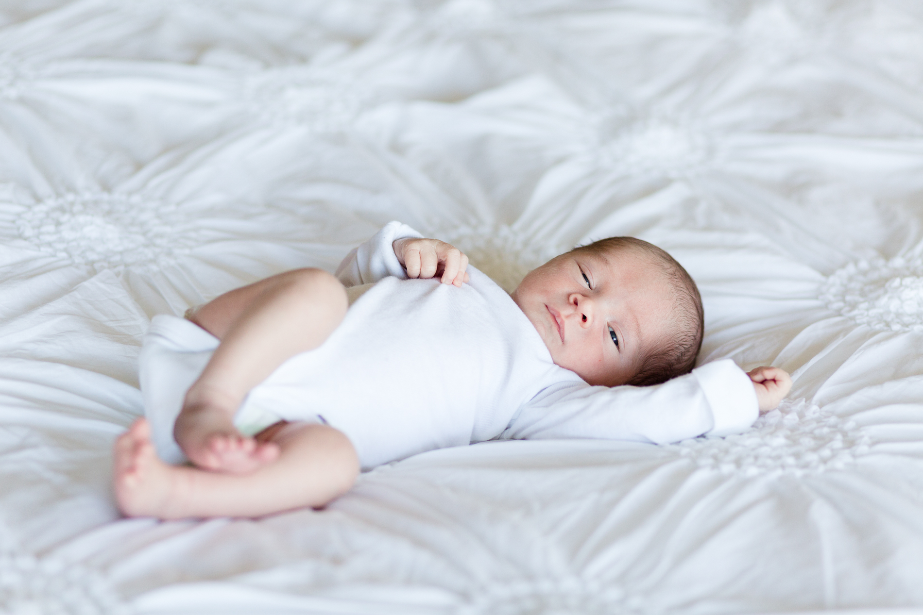 San Diego Lifestyle Newborn Photographer Christine Dammann Photography baby on bed