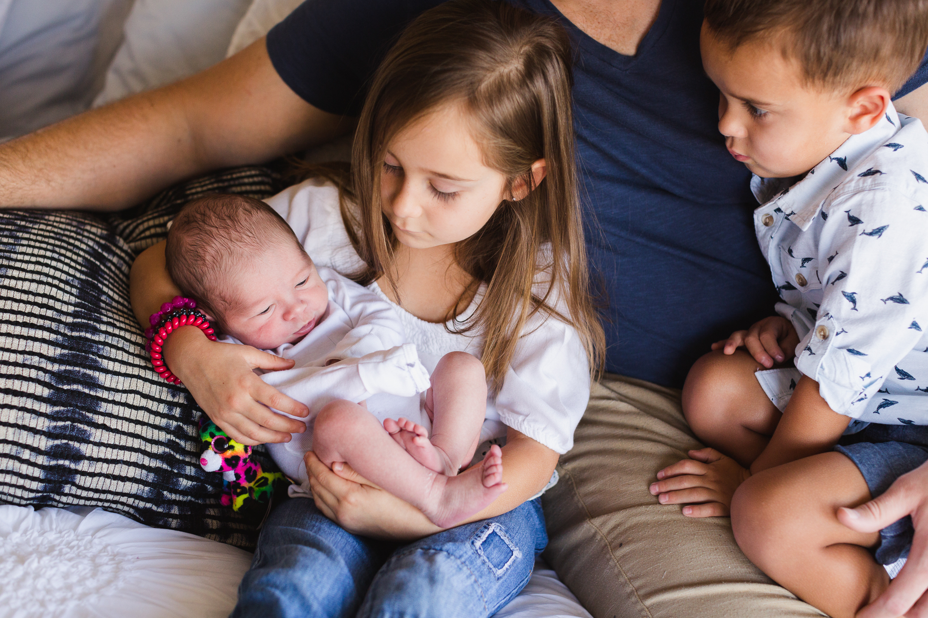 San Diego Lifestyle Newborn Photographer Christine Dammann Photography Big sister holding baby