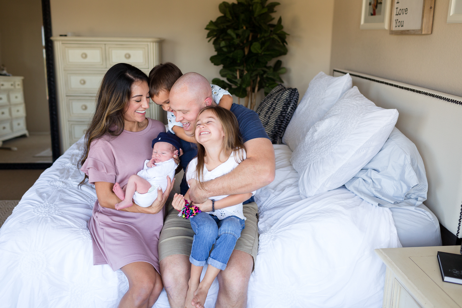 San Diego Lifestyle Newborn Photographer Christine Dammann Photography family laughing together