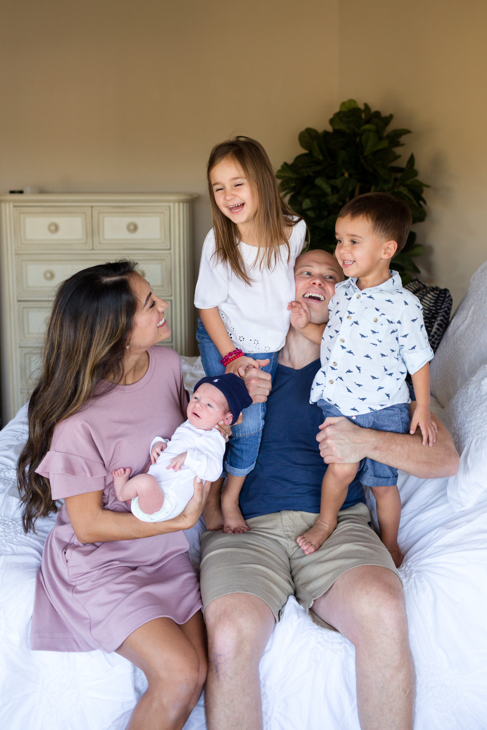 San Diego Lifestyle Newborn Photographer Christine Dammann Photography beautiful family laughing