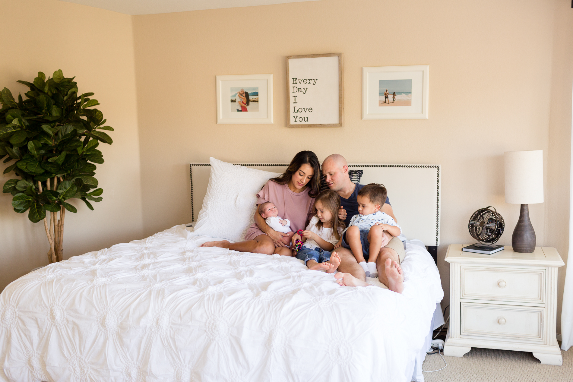 San Diego Lifestyle Newborn Photographer Christine Dammann Photography Family laughing on bed