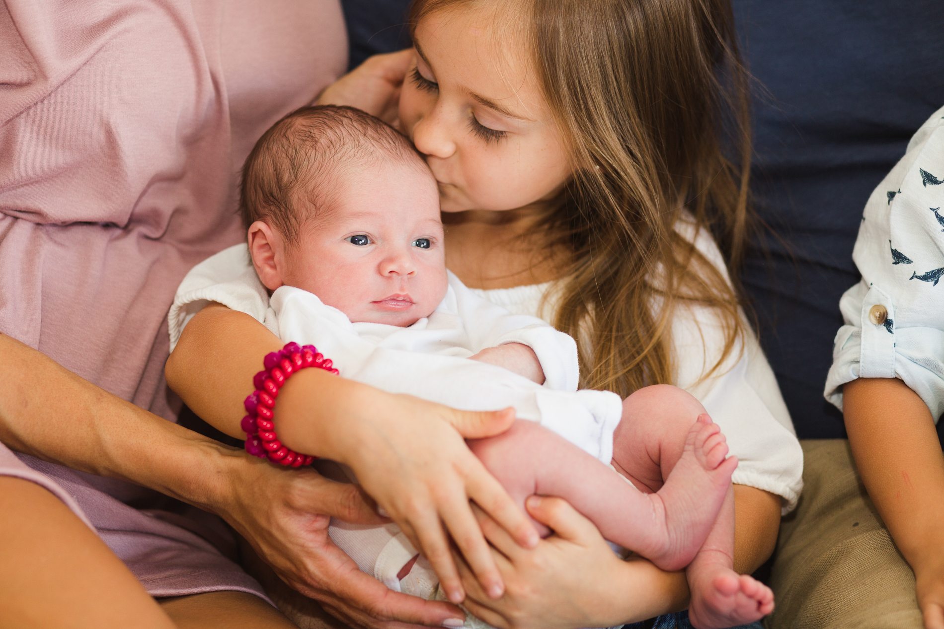 San Diego Lifestyle Newborn Photographer Christine Dammann Photography Big sister kissing baby