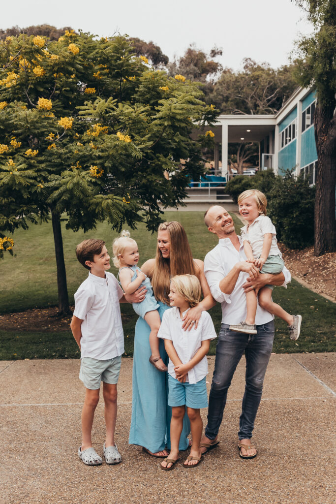 Genuine smiles during a family photoshoot with kids