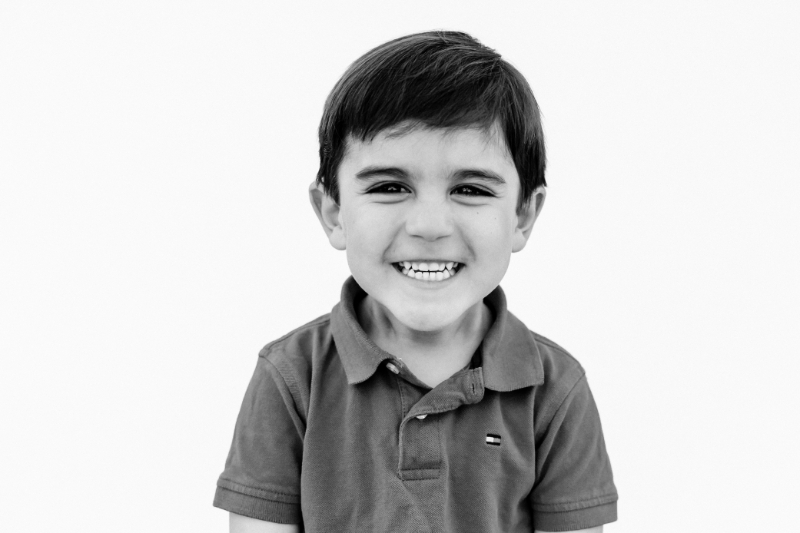 Smiling young boy in classic school portrait, perfect example image for GotPhoto for preschool photography used in school picture day galleries.